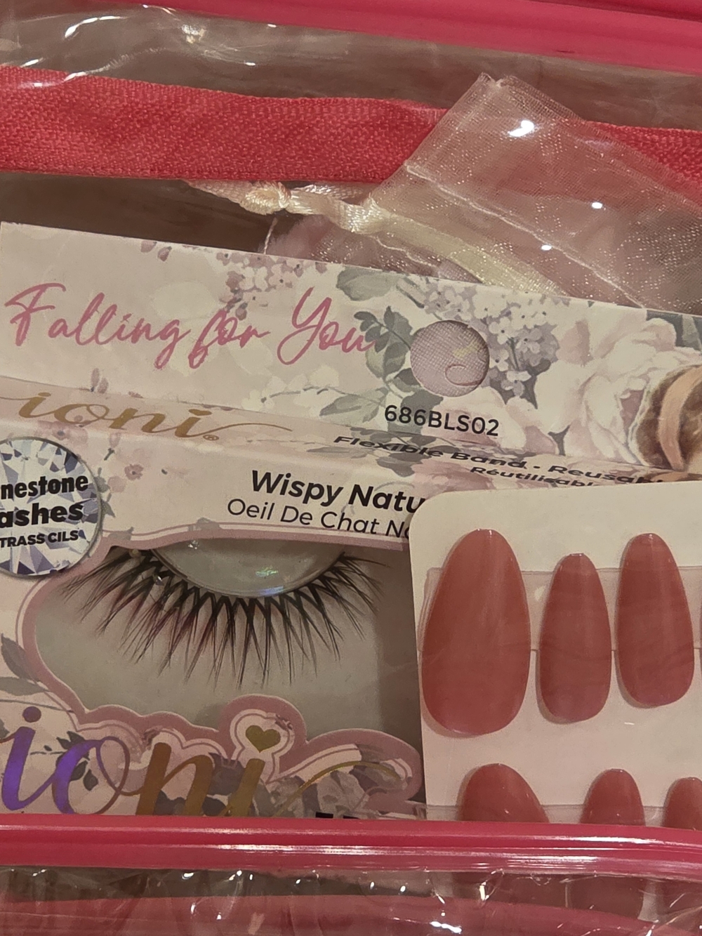 Glow To Go Purse - Pink Cateye Nails And Wispy Lashes